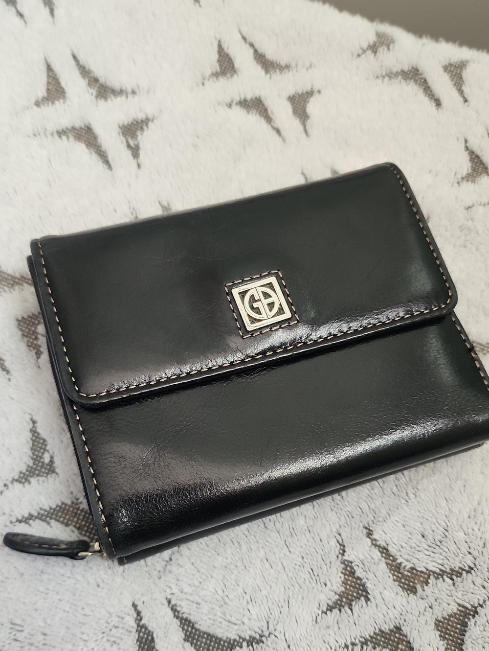 Women's Black Leather Wallet with Silver Emblem